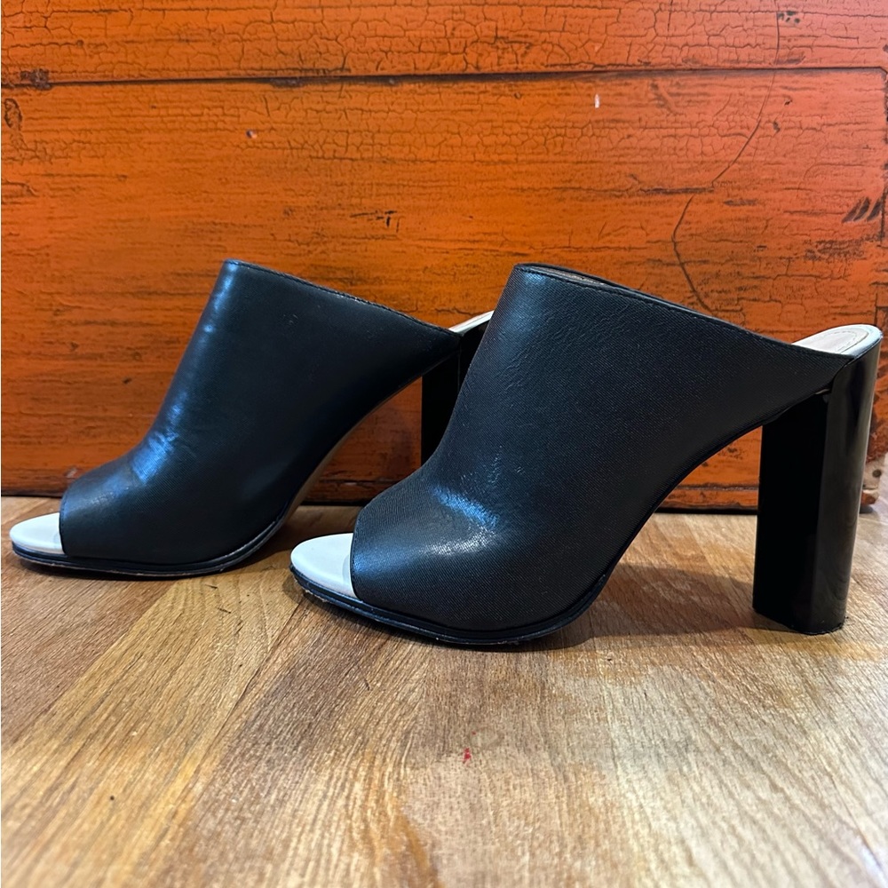 Gently used French Connection block heel open toe mule.